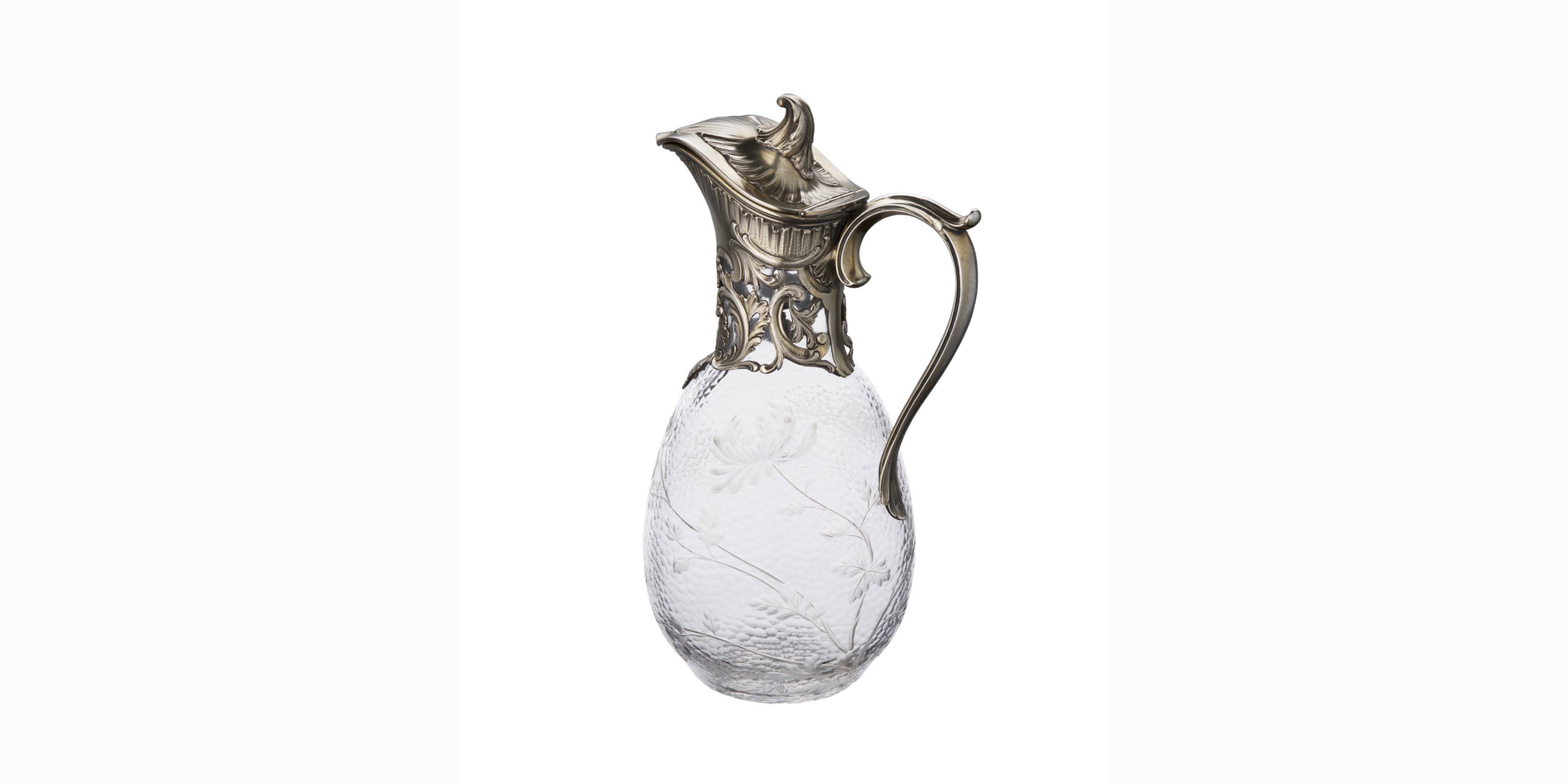 Crystal carafe, seaweed decor frame